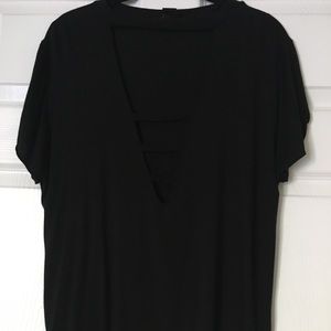 Black t-shirt with chest slit cut outs. L